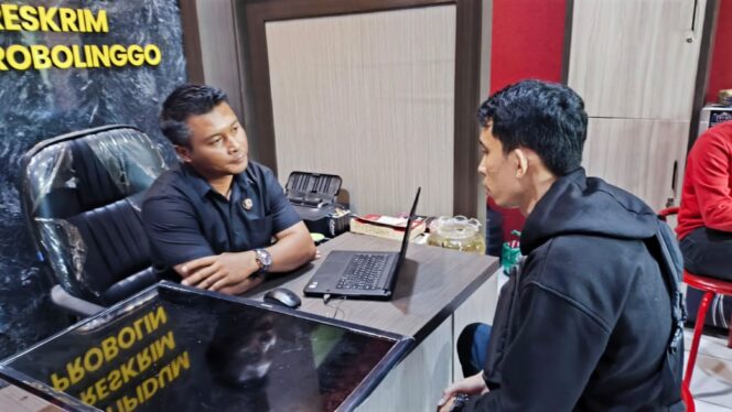 
					NEKAD: Christian Adi Purnomo (33) saat diperiksa penyidik di Polres Probolinggo. (foto: Ali Ya'lu).