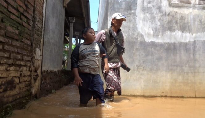 
					Banjir di Kecamatan Winongan, Kabupaten Probolinggo. 